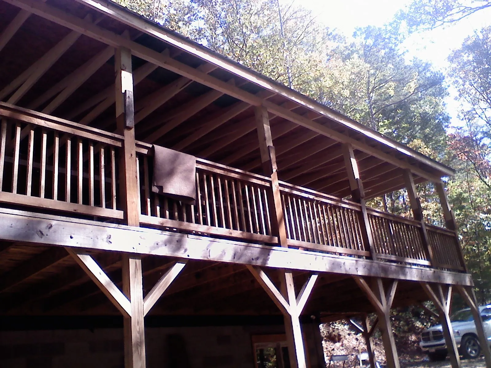Timber framing under a new elevated porch and deck — Roof Leak Repair in Armonk by Roofing Brothers